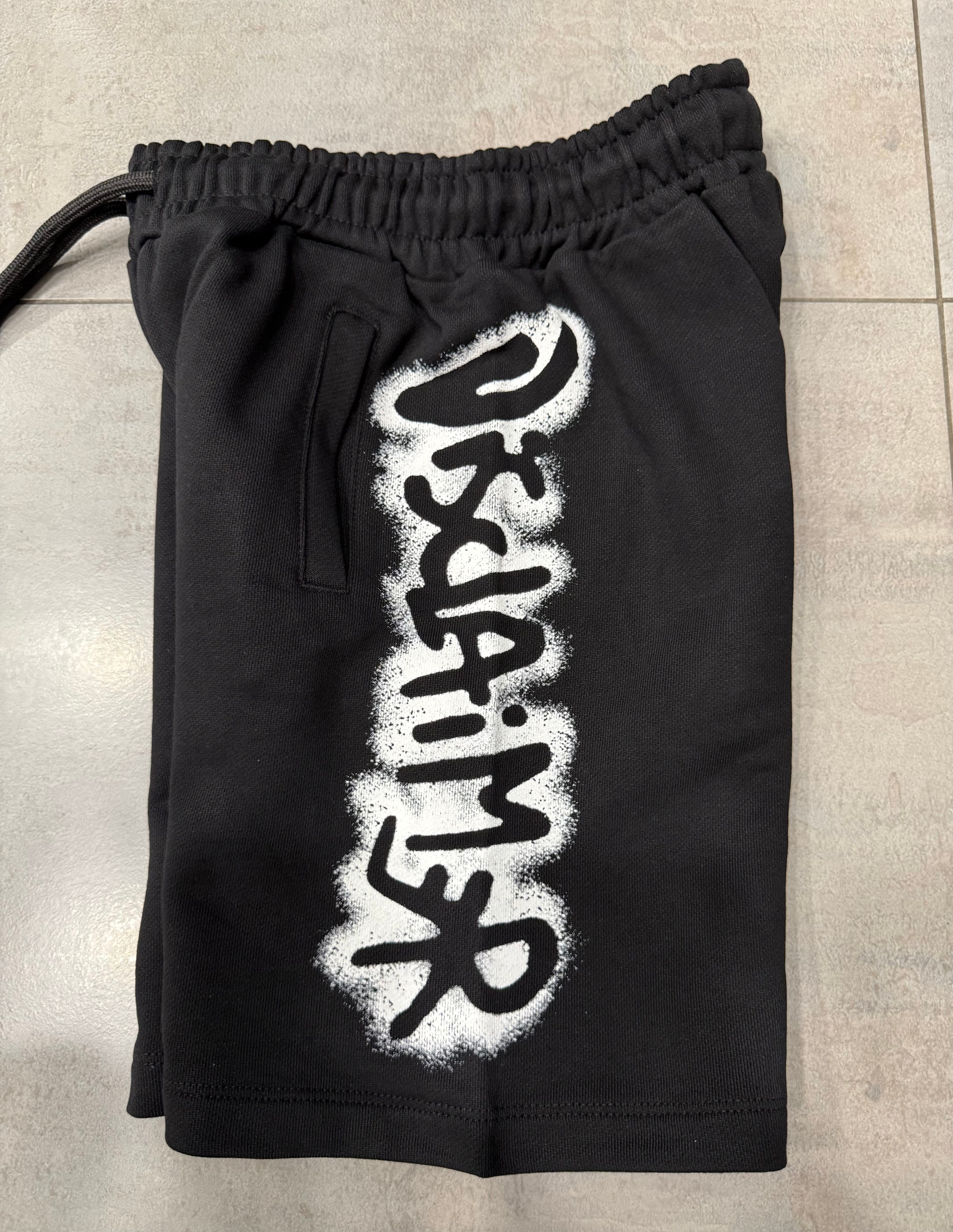 Bermuda in Felpa di Cotone | Nero con Stampe Laterali Colorate DISCLAIMER l'aquiloneBermuda felpa Disclaimer neroabbigliamento bambino